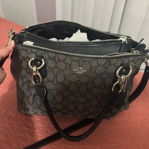 New- never used Coach Signature bag.